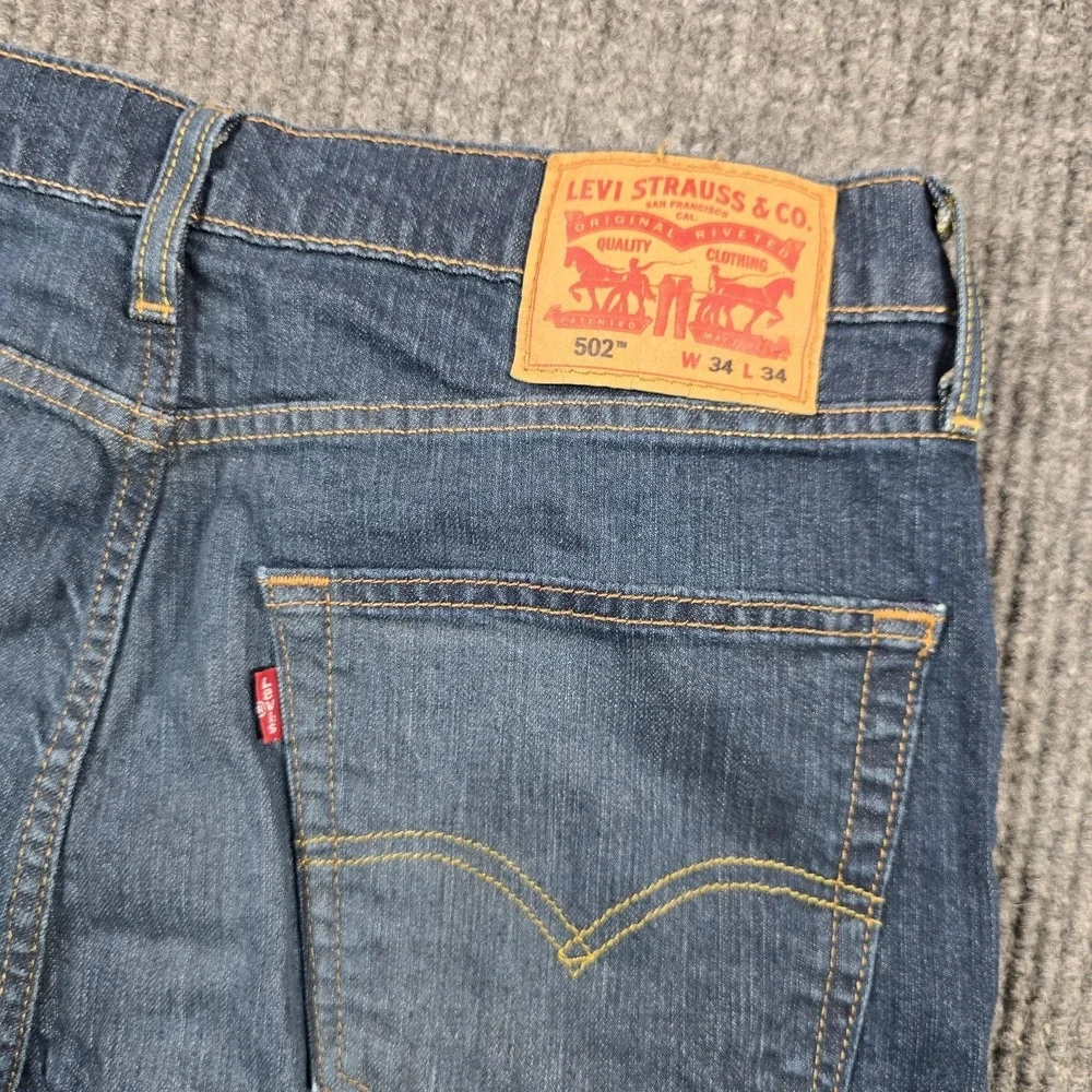 Levi's 502 Jeans Mens 34x34 Blue Regular Tapered Medium Wash Stretch Denim 32x31